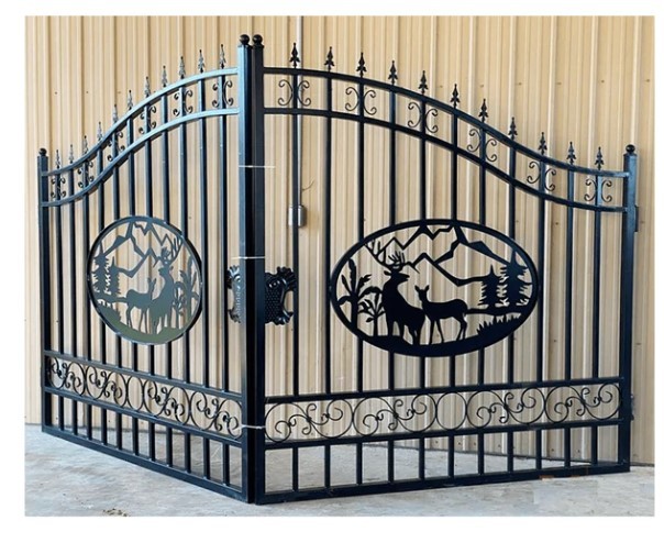 lot 1013K image: 14 Foot - Unused 2023&nbspGreatbear Bi-Parting Iron Gate. With artwork Deer in the Middle of Gate Frame.