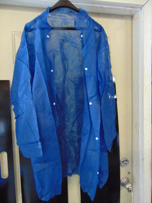 lot 4208 image: (2) cases PP Labcoats Item # 47241723- XL Blue, 30 lab coats per case