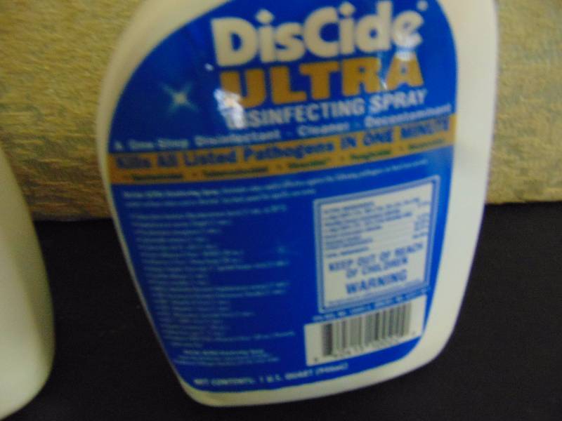lot 4232 image: (2) 1- quart bottles DisCide Ultra Disinfecting Spray, kills pathogens in 1 minute $30.00 value