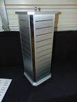 lot 4233 image: (1) Silver Jewelry Display, holds Jewelry cards, spins, 9-12 x 9-12 x 26 tall, 12 slats per side