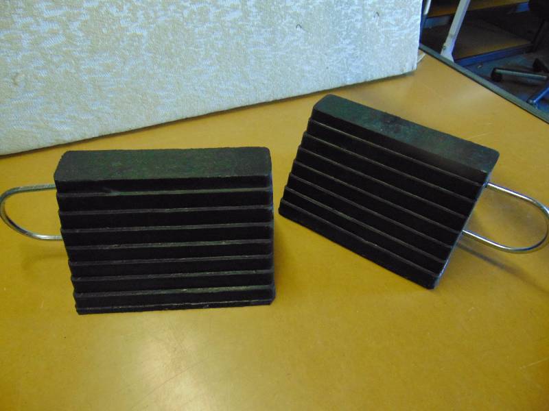 lot 4328 image: (1) pair rubber wheel chocks with metal handle