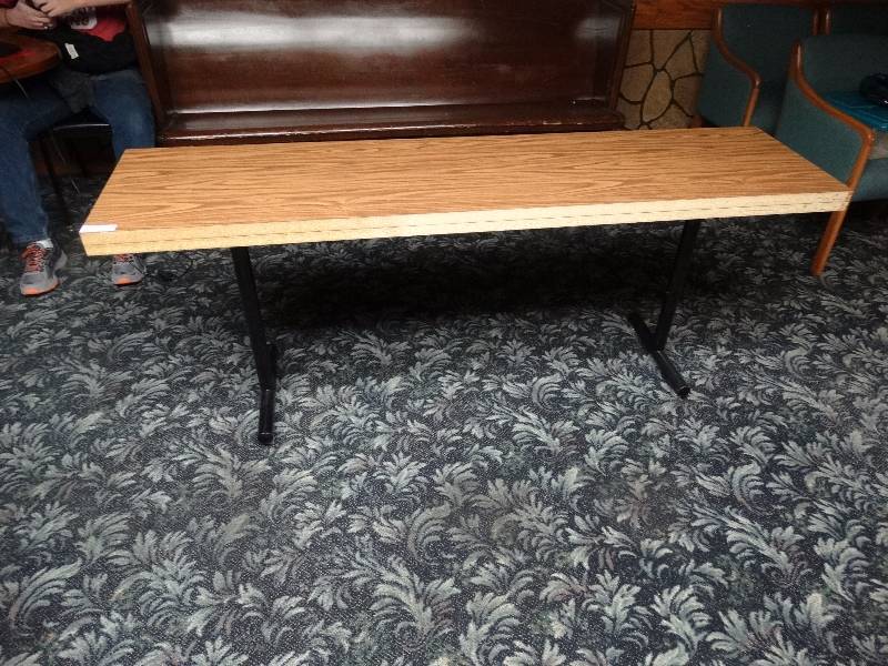 lot 415 image: Long rectangle table with metal legs.
