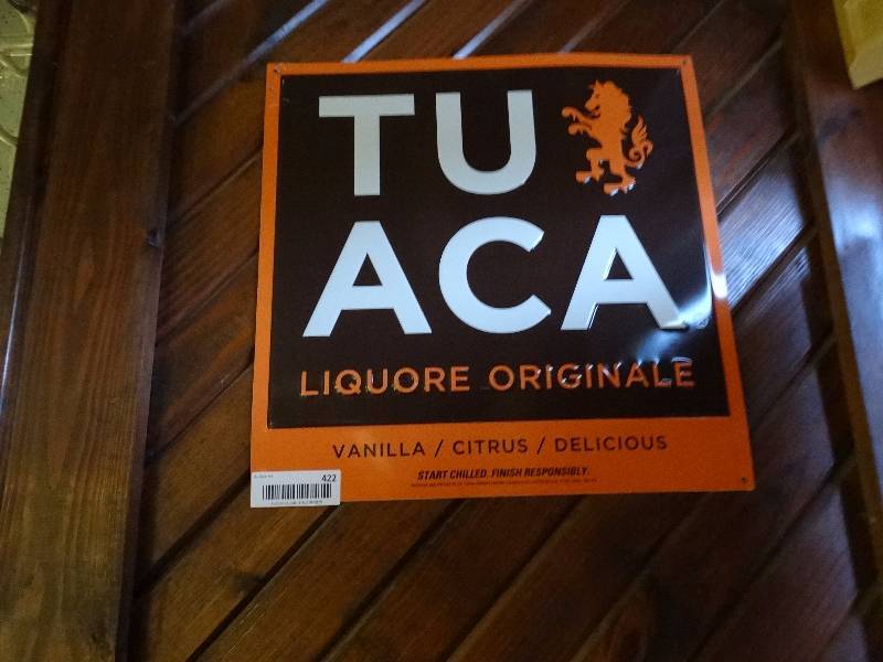 lot 422 image: Metal tuaca sign.