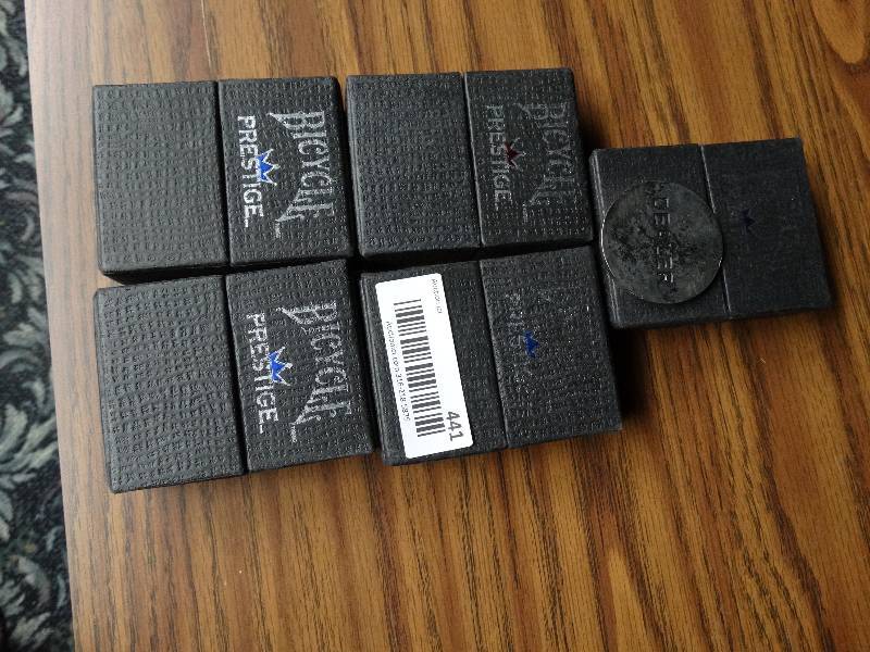 lot 441 image: 5 bicycle prestige decks of cards in cases and dealer coin.