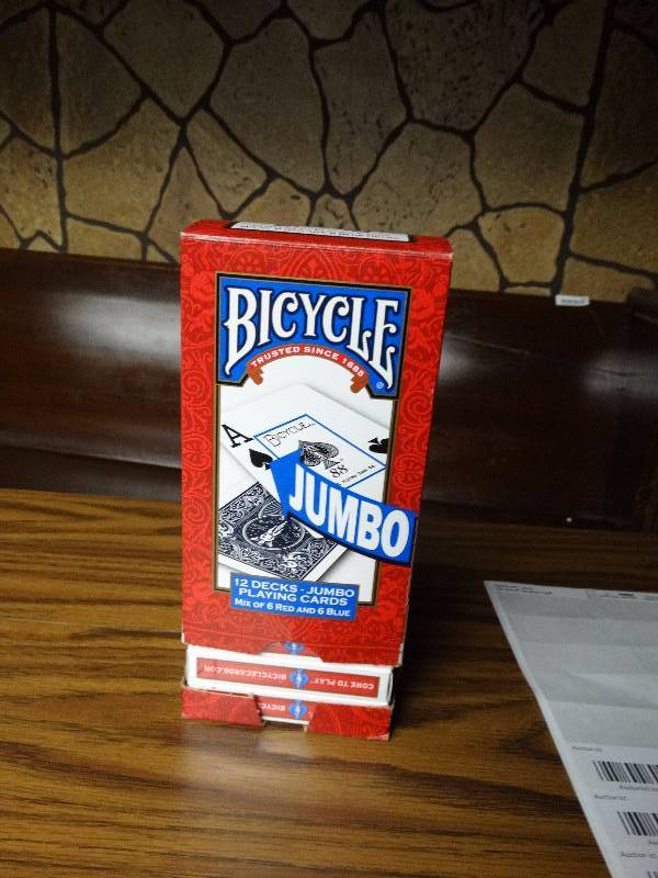lot 442 image: 9 new decks of cards.