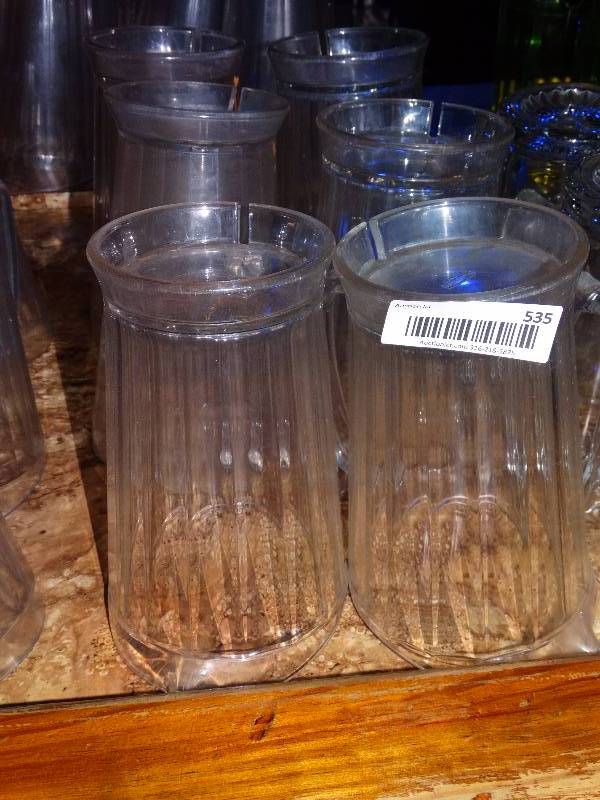 lot 535 image: 6 plastic pitchers.