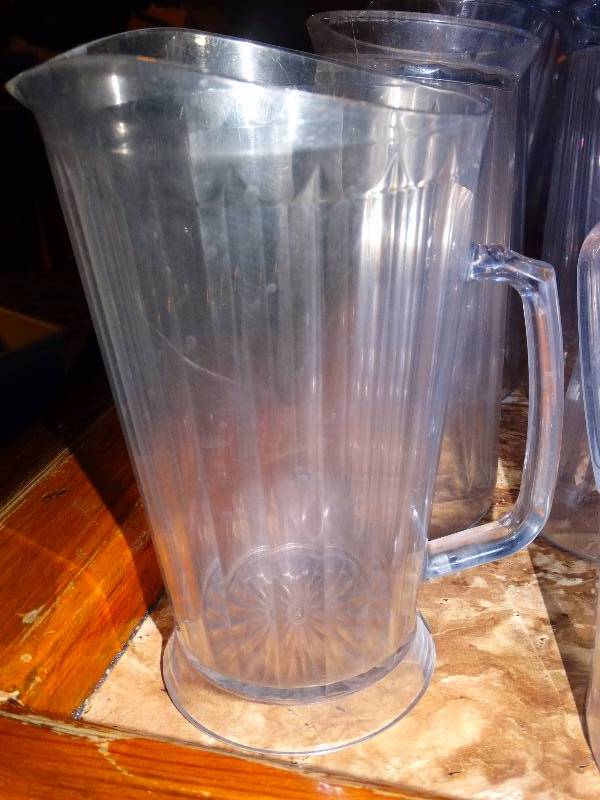 lot 536 image: 6 plastic pitchers.