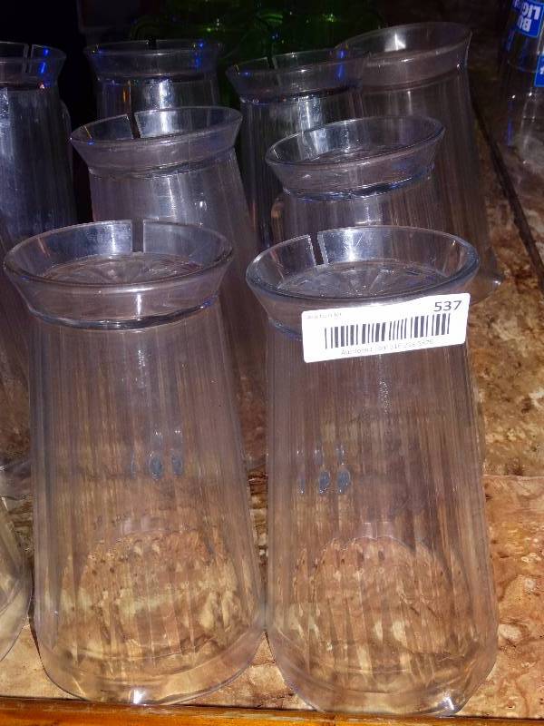 lot 537 image: 7 plastic pitchers.