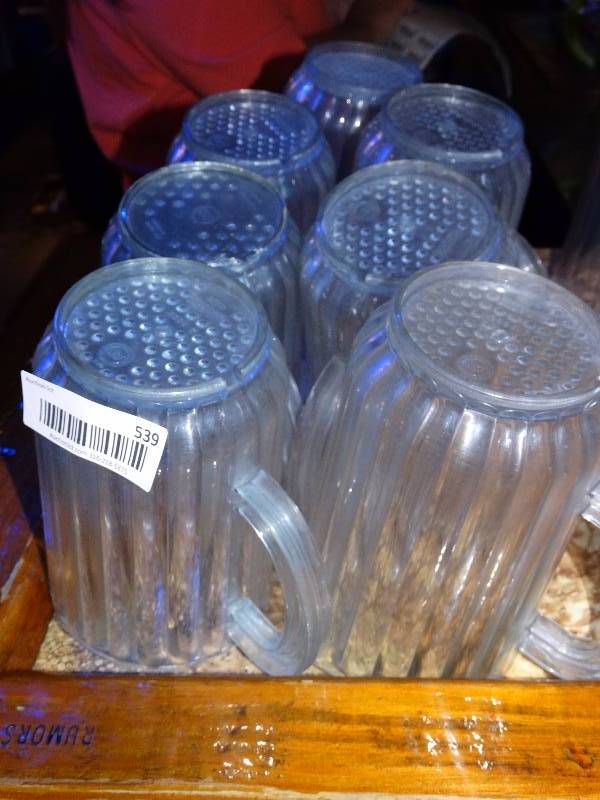 lot 539 image: 7 plastic pitchers.