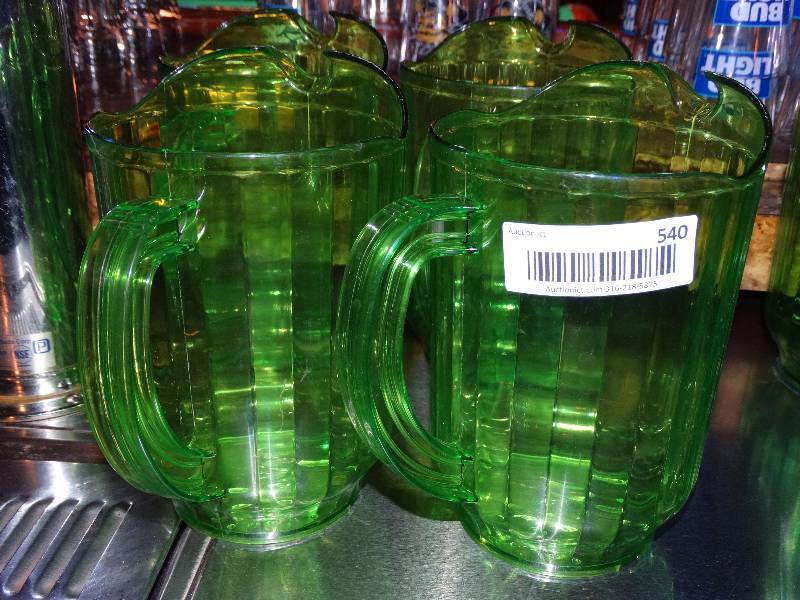 lot 540 image: 4 plastic pitchers.