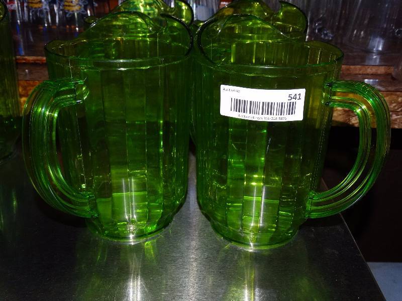 lot 541 image: 4 plastic pitchers.