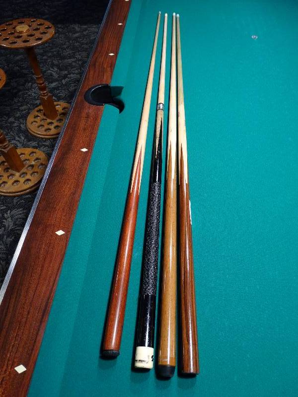 lot 545 image: 4 pool cues.