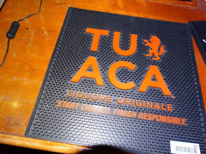 lot 663 image: Tuaca mat.