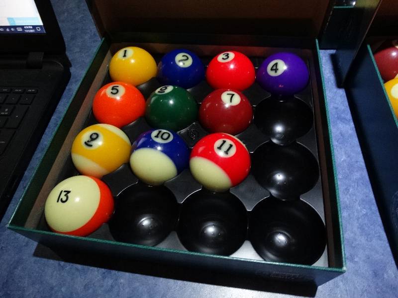 lot 672 image: Set of pool balls. Missing Q, 8, 12, 14. 15 balls.