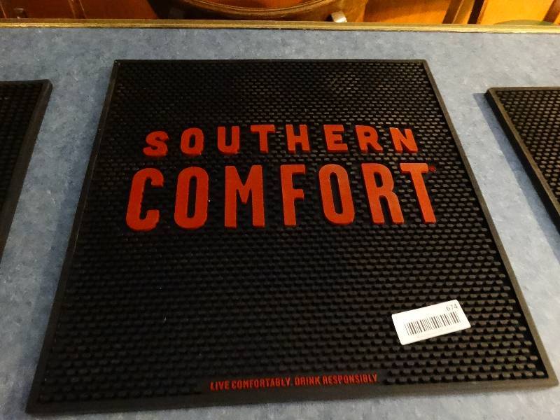 lot 674 image: Large Southern Comfort bar mat