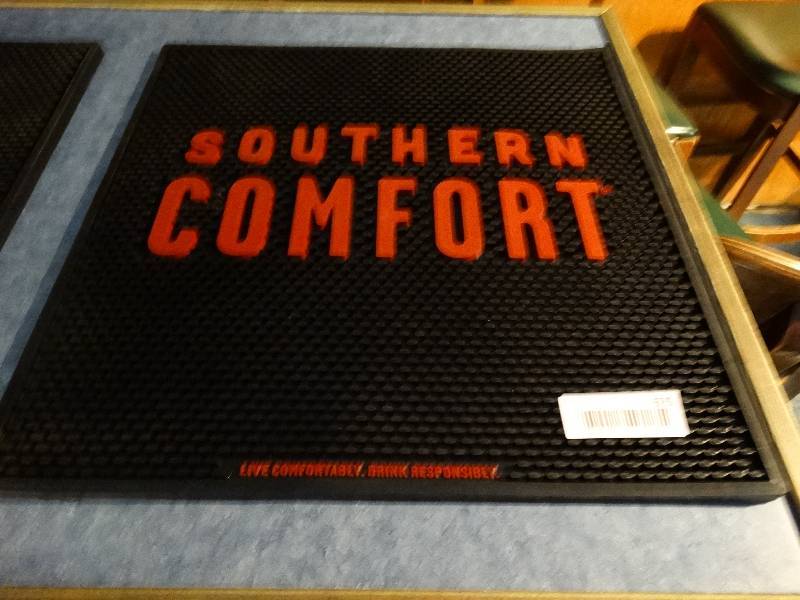 lot 675 image: Large Southern Comfort bar mat