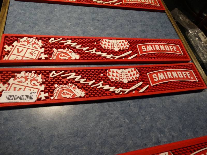 lot 677 image: 2 new Smirnoff bar mats