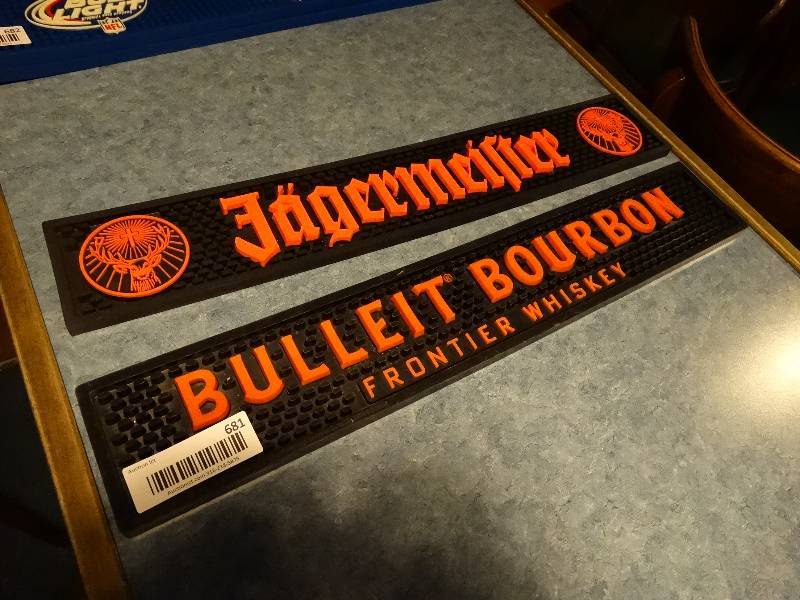 lot 681 image: Bulleit Bourbon bar mat & Jagermeister bar mat