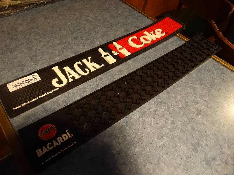 lot 683 image: Bacardi bar mat & Jack & Coke bar mat