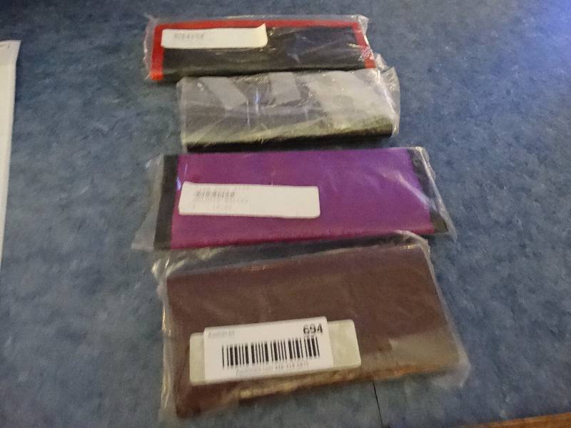 lot 694 image: Lot of 4 Dart cases, new in packages.