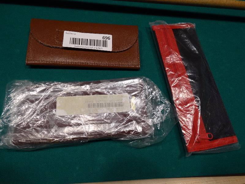 lot 696 image: Lot of 3 Dart cases - still in packages.