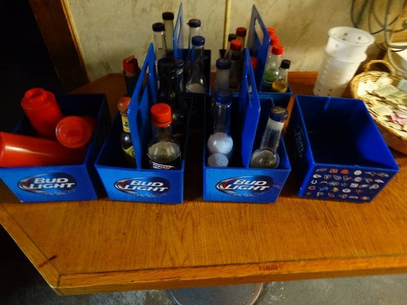 lot 700 image: 6 Bud Light Condiment holders, contents included.