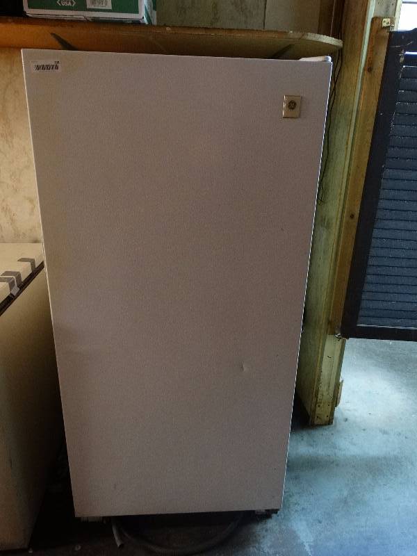 lot 708 image: GE Upright Freezer - works good. Contents NOT included.