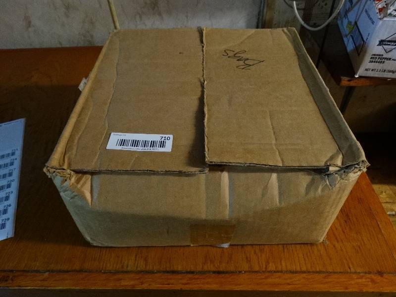 lot 710 image: Box of plastic carry out bags.