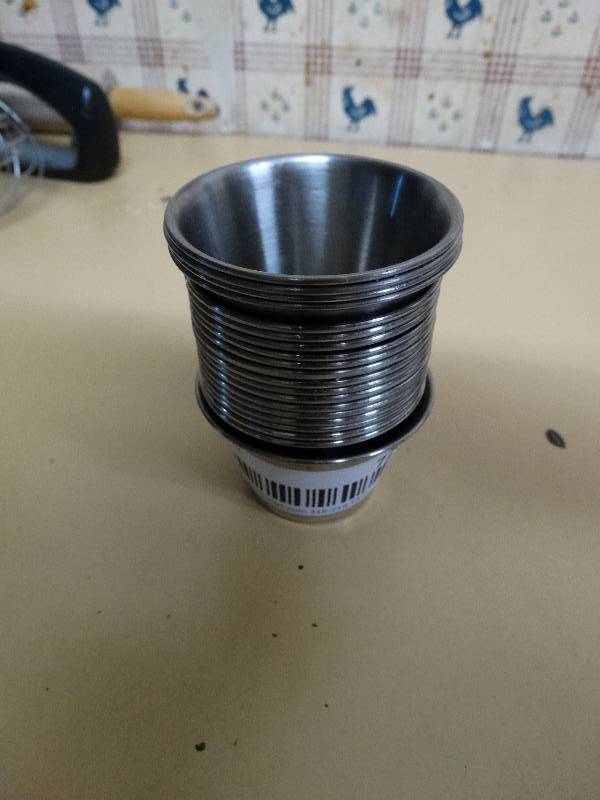lot 720 image: Lot of 20 stainless steel saucedressing cups.