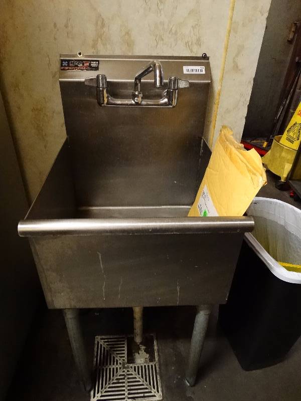 lot 728 image: Stainless steel hand washing sink wfaucet. Buyer responsible for removal.