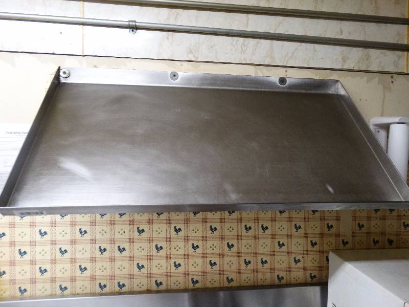 lot 730 image: Stainless Steel wall shelf.