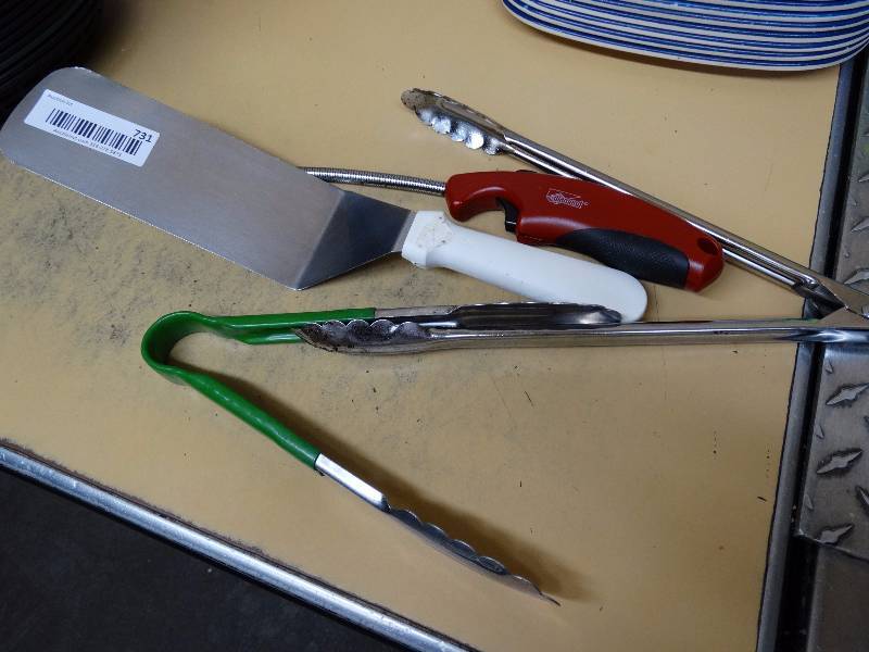 lot 731 image: 3 cutting mats & lot of kitchen utensils. Tongs, spatula, lighter.