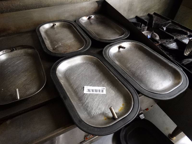 lot 748 image: Lot of 9 stainless steel hot entree serving plates & 7 under plates.