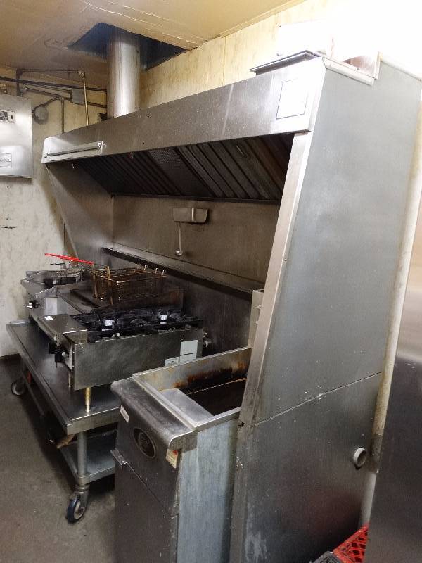 lot 759 image: Stainless steel 8ft. exhaust hood system. Includes Ansul system. Does not include vent pipe or exhaust fan.
