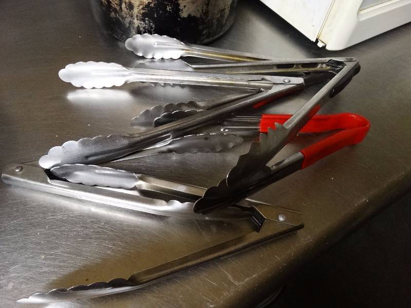 lot 761 image: Lot of 6 stainless steel tongs.
