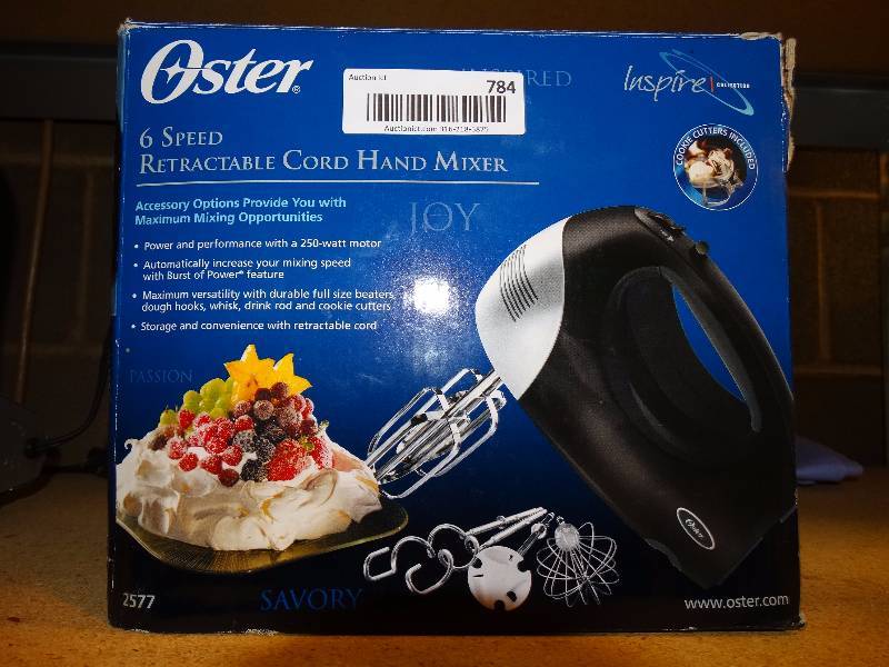 lot 784 image: Oster hand mixer.