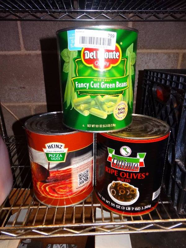 lot 799 image: 3 Large cans 1 green beans, 1 pizza sauce, 1 olives.