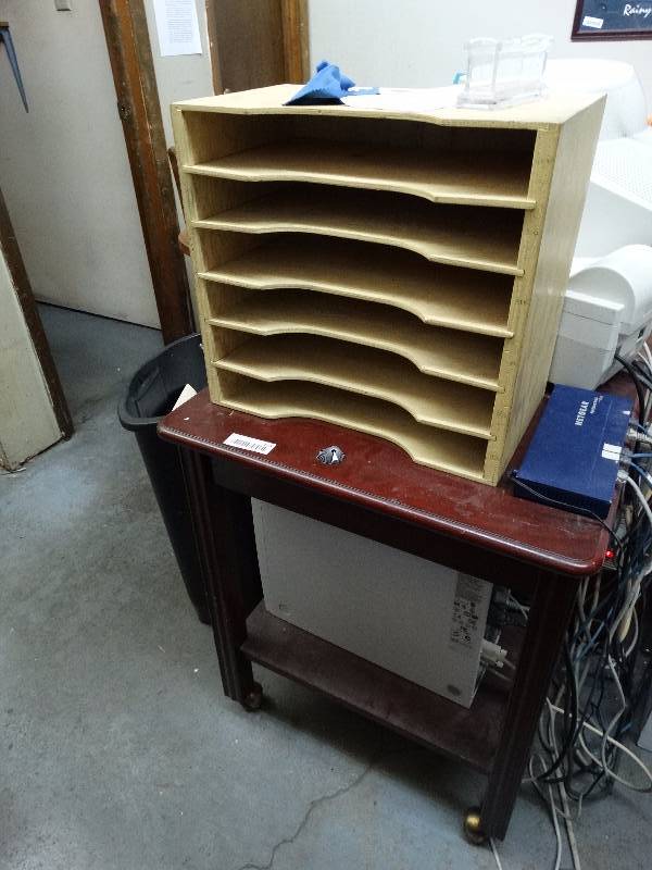 lot 838 image: Little table wfile sloter.