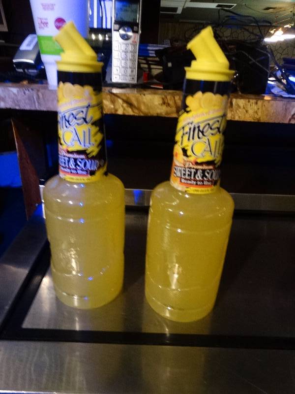 lot 896 image: 2 unopened bottles of Sweet & Sour