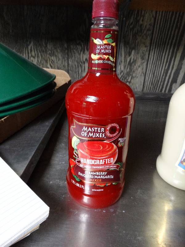 lot 905 image: Unopened bottle of strawberry daiquiri mixer