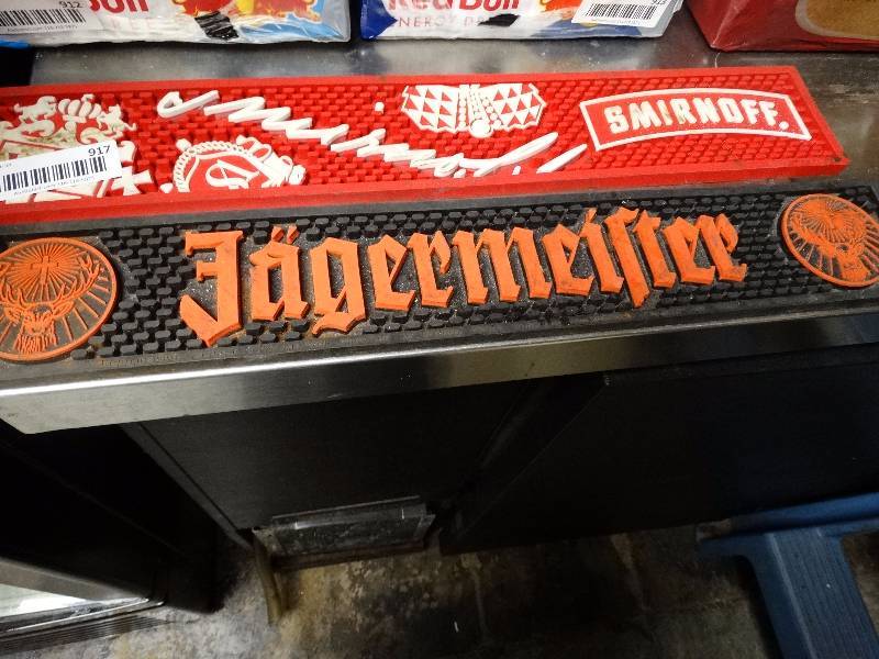 lot 917 image: Jagermeister bar mat & Smirnoff bar mat