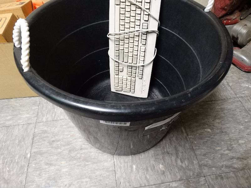 lot 920 image: Lg bucket w various table covers, misc.