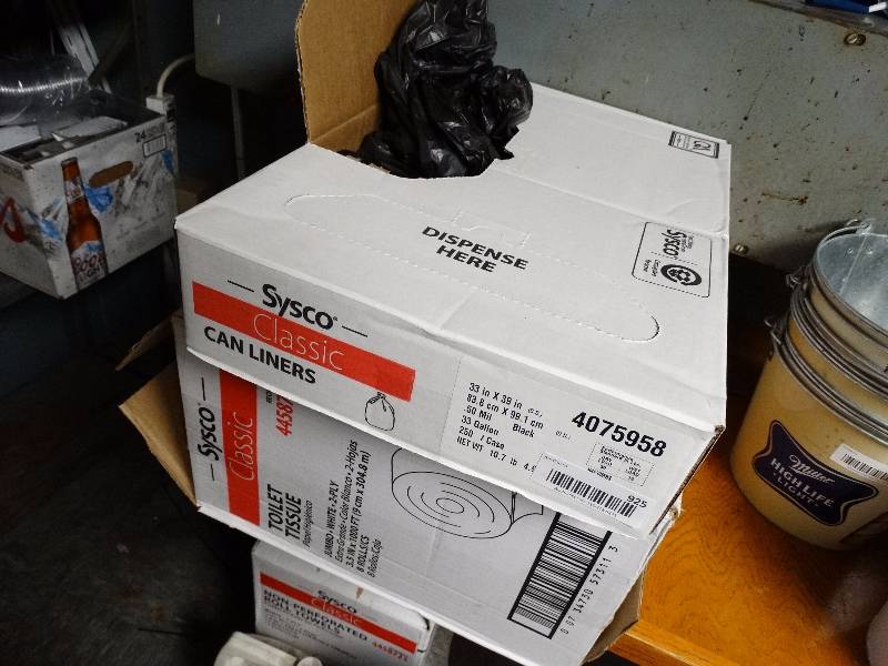 lot 925 image: Partial box of can liners partial box of toilet paper