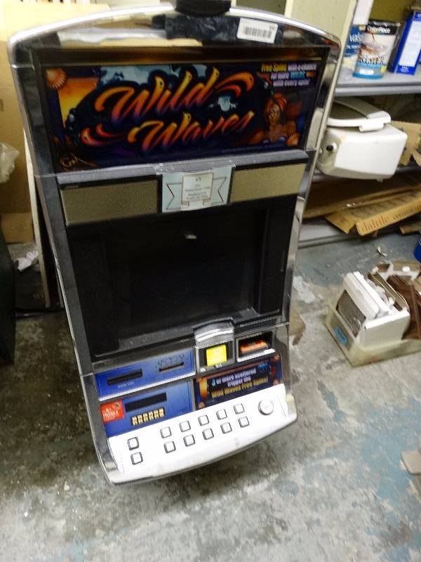 lot 950 image: Wild Waves arcade machine w stand