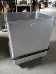 Stainless steel cart on wheels.
