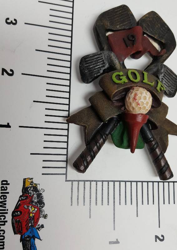lot 6125 image: New 3 dimensional plastic fridge magnet of golf clubs, tee and ball