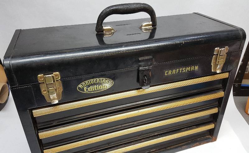 lot 6127 image: Black 14 tall X 21 wide and 9 deep Craftsman HD steel tool box with 4 drawers and latch over lock.
