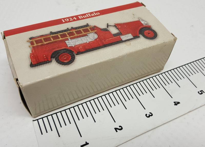 lot 6060 image: Small new in the package toy antique looking Fire Truck