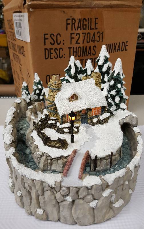 lot 5974 image: Thomas Kinkade Waterfall. Soothing sound of the waterfall and lighted house Take two AA batteries, Water pump included