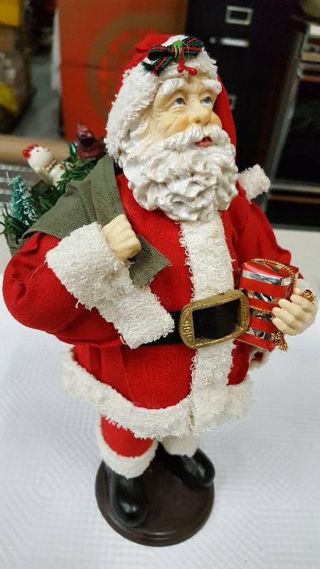 lot 5987 image: Santa loaded up with his bag of toys for the top of the fireplace